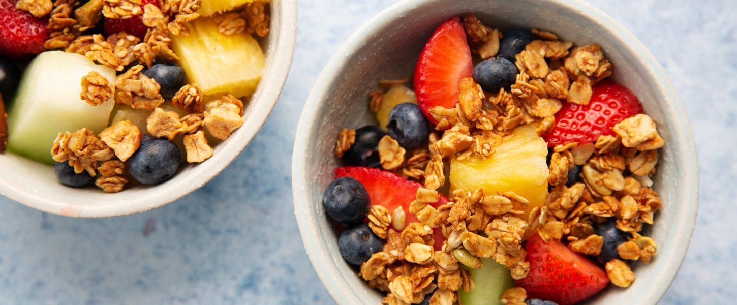 Bowls with fruit and granola